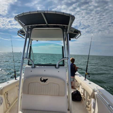 a boat parked next to a body of water