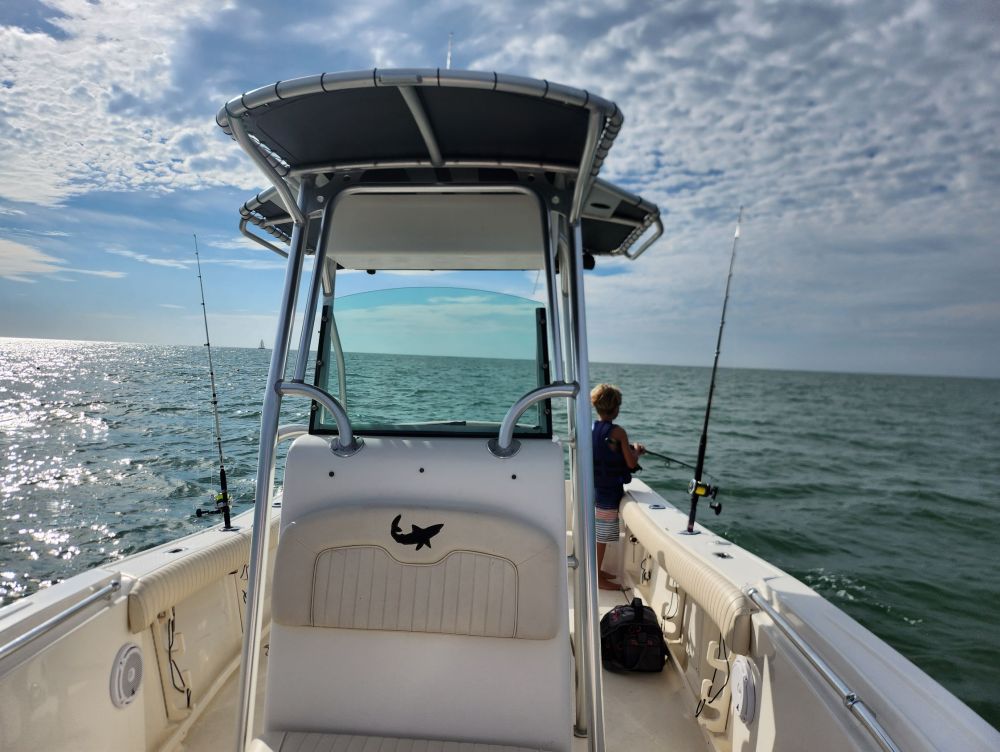 a boat parked next to a body of water