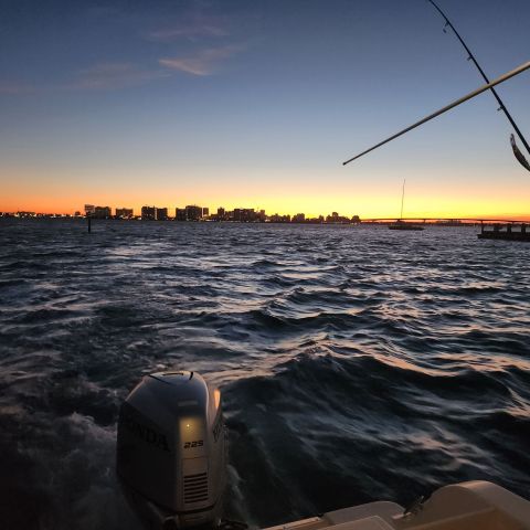 a sunset over a body of water