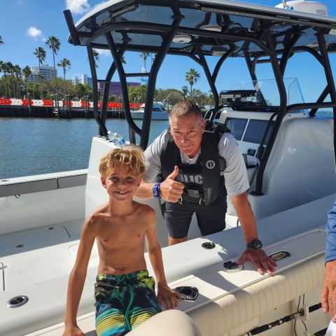 a couple of people that are sitting on a boat
