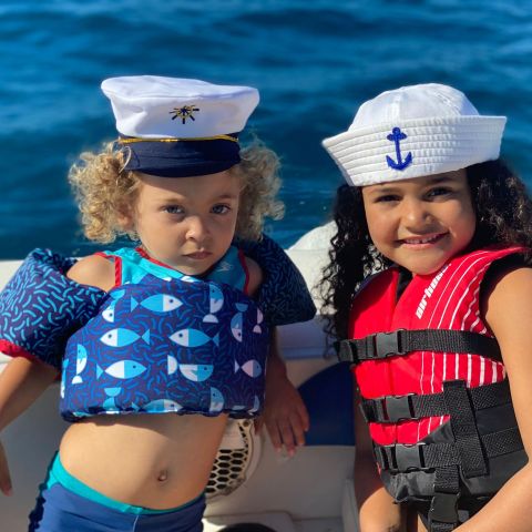 a small child is looking at the camera