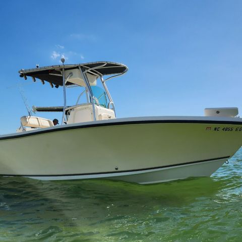 a small boat in a body of water