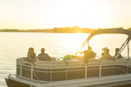 Pontoon boat rental in Sarasota during a sunset cruise with friends