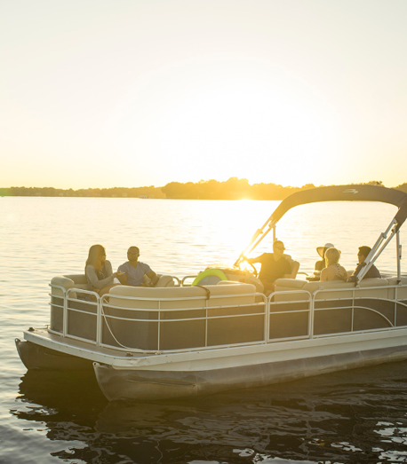 Pontoon boat rental in Sarasota during a sunset cruise with friends