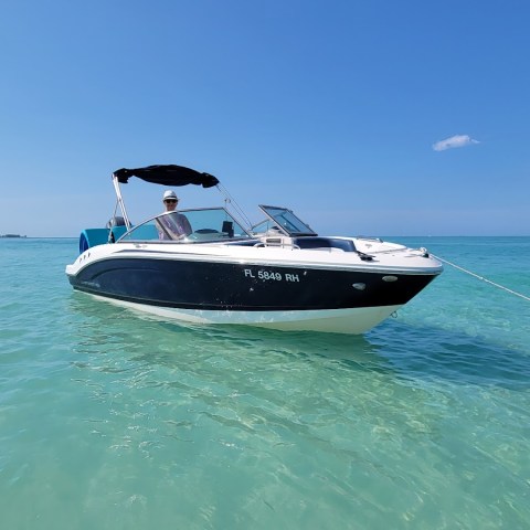 a small boat in a body of water