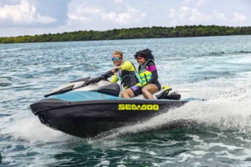 a man riding on a jet ski in the water