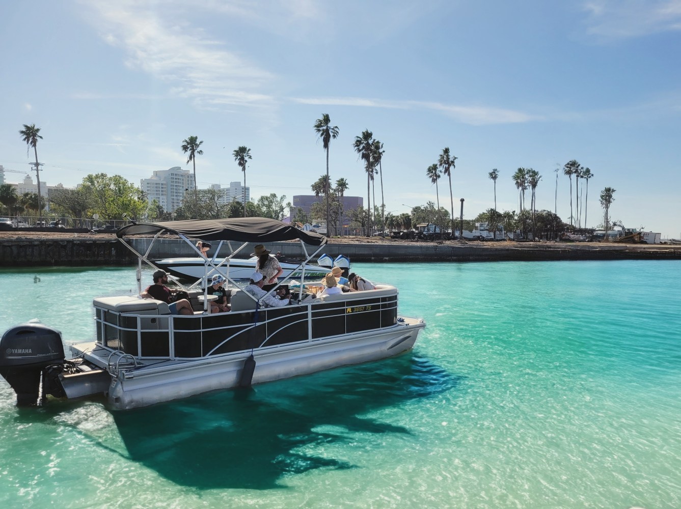 a boat is docked next to a body of water