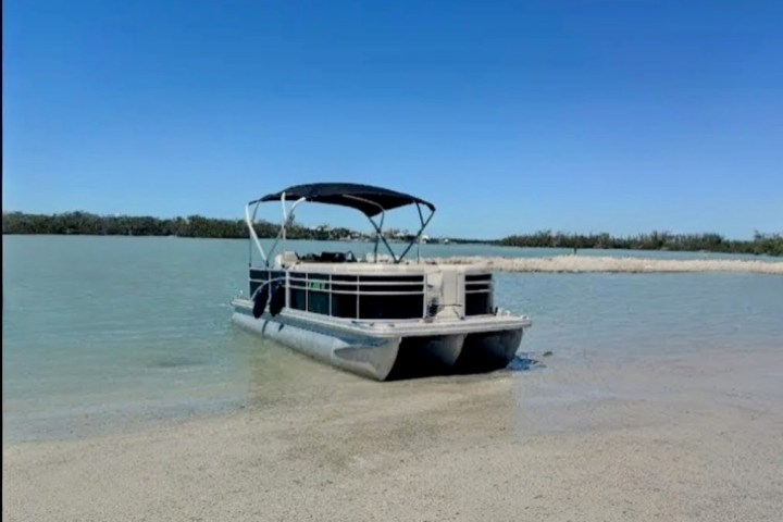 a small boat in a body of water