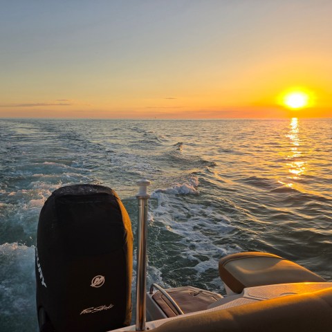 a sunset over a body of water