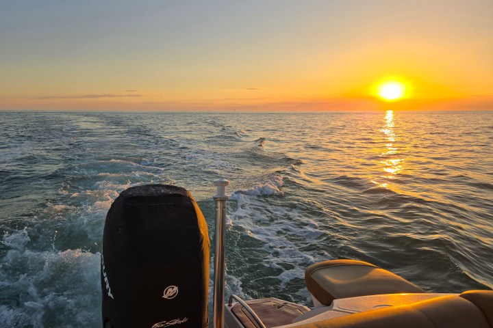 a sunset over a body of water