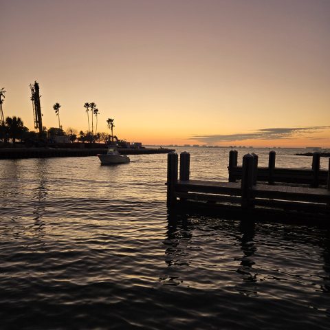 a sunset over a body of water